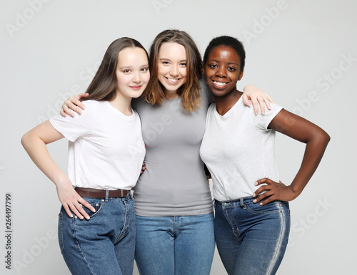 Close-up portrait of charming multiracial girls 
