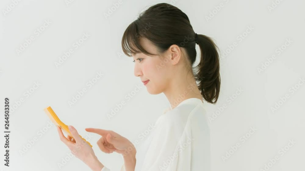 電卓・女性