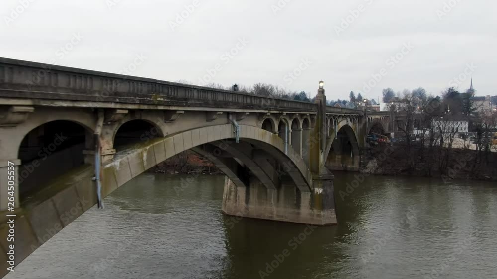 Aerial slow push in on Veterans Memorial Bridge as it touches land on the Wrightsville side of the Susquehanna River. Concept: engineering, building, bridges, winter Aerial slow push in on Veterans Memorial Bridge as it touches land on the Wrightsville side of the Susquehanna River. Concept: engineering, building, bridges, winter