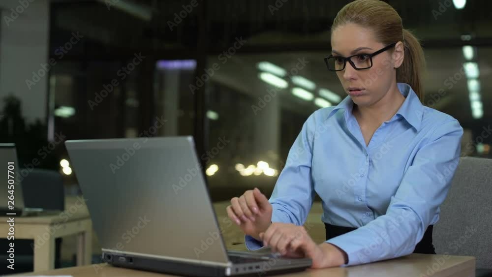 Exhausted businesswoman yawning, working night shift in office, overwork concept Exhausted businesswoman yawning, working night shift in office, overwork concept