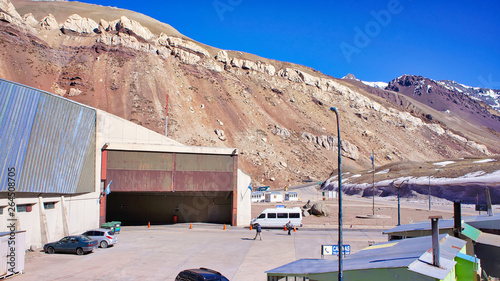 Paseo Internacional  Los Libertadores, Argentina-20 August, 2017: Driving from Santiago to Mendoza, International bus station near the border of Argentina and Chile close to Aconcagua sky resort © eskystudio