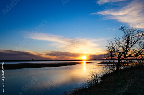 Lake Bemidji, Minnesota at Mississippi River outlet at sunset.