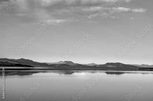 black and white lake landscape with mountains 