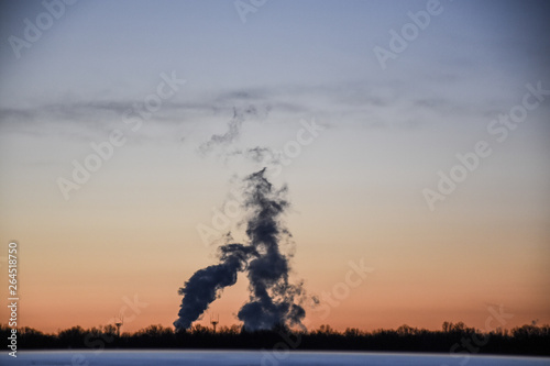 factory smoke during sunset