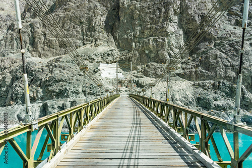 Bridge cross the Shyok river in Nubra Valley at Turtuk, Leh Ladakh. Turtuk is a village 205 km from Leh near Pakistan photo