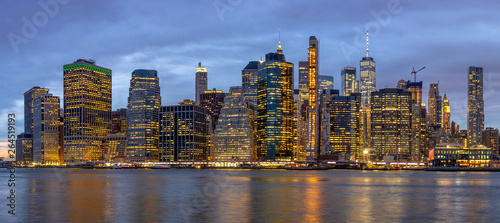 Panorama scene of New york Cityscape with Brooklyn Bridge beside the east river at the twilight time  USA downtown skyline  Architecture and building with tourist concept