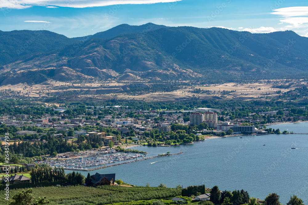 Magnificent view over Okanagan lake and valley with high clouds in the sky