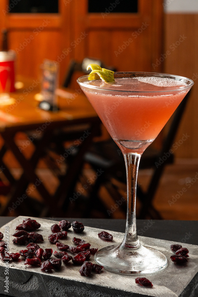 cosmopolitan cocktail is on the bar. Space for text. Photo for the menu. cosmopolitan cocktail is on the bar. Space for text. Photo for the menu.