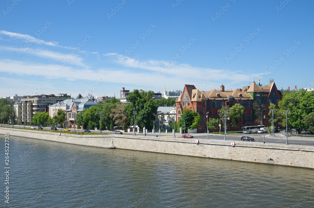 View of Prechistenskaya embankment on a Sunny summer day. Moscow, Russia
