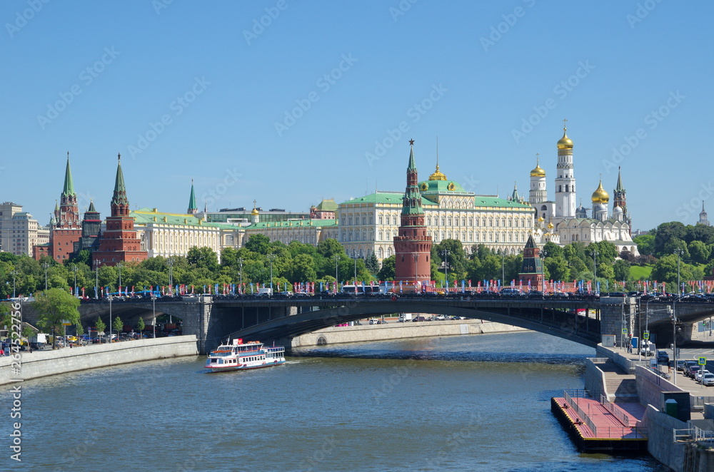 Moscow, Russia - June 15, 2018: Summer view of the Moscow Kremlin and the Big Stone bridge Moscow, Russia - June 15, 2018: Summer view of the Moscow Kremlin and the Big Stone bridge