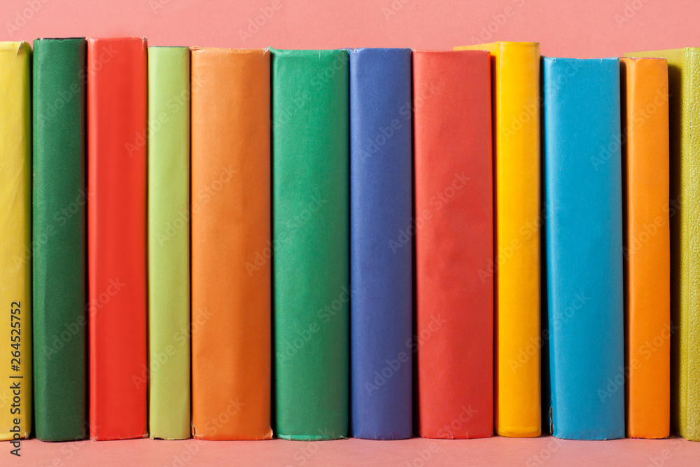 Row of colorful books. Education background. Back to school. Copy space for text.