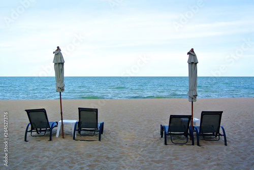 Beach chair and umbrella on idyllic tropical sand beach. Phuket  Thailand