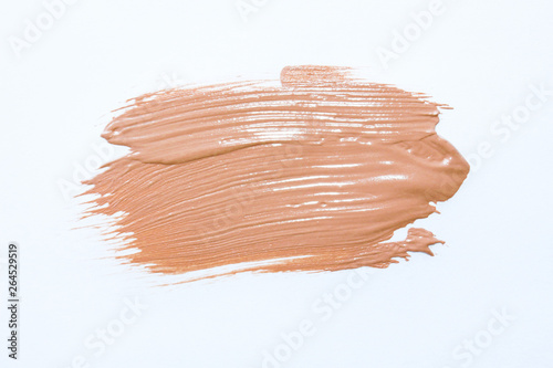 Liquid foundation smudges isolated on white background. Light  tone foundation texture for background. BB, CC cream foundation. Make-up base foundation.Professional makeup products. Top view.