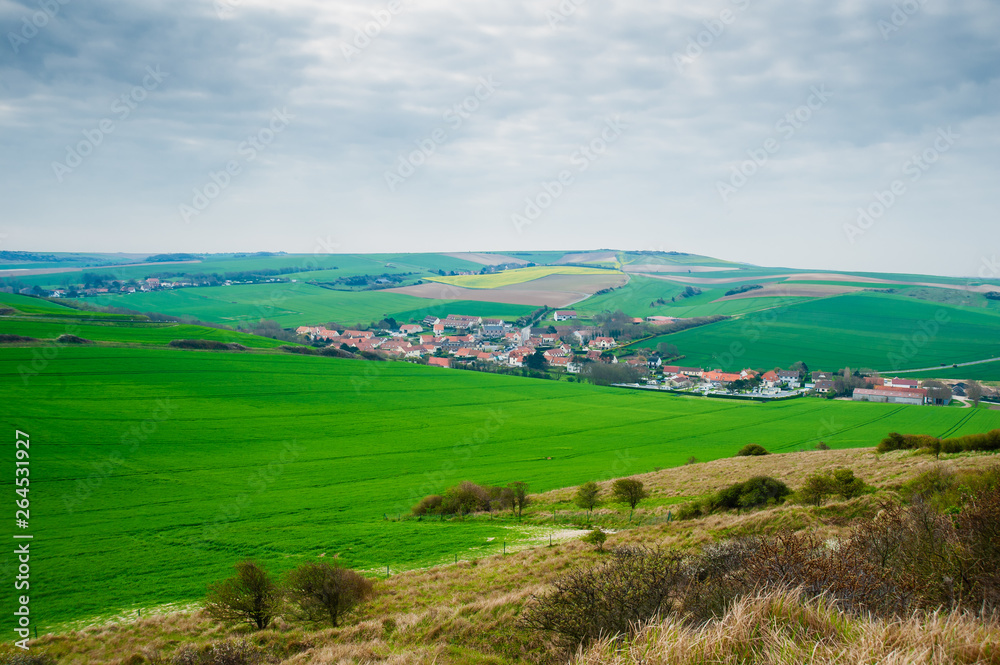 view on the landscape and the village l' Escale when mounting the cliff of Cap Blanc Nez in springtime in the region of Nord Pas de Calais