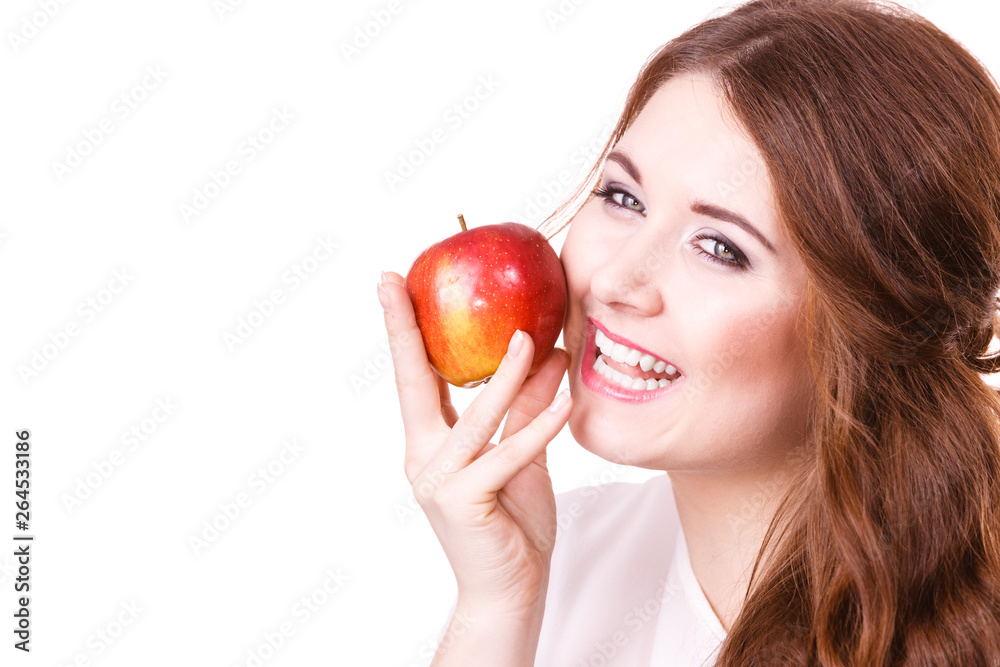 Woman holds apple fruit close to face, isolated Woman holds apple fruit close to face, isolated