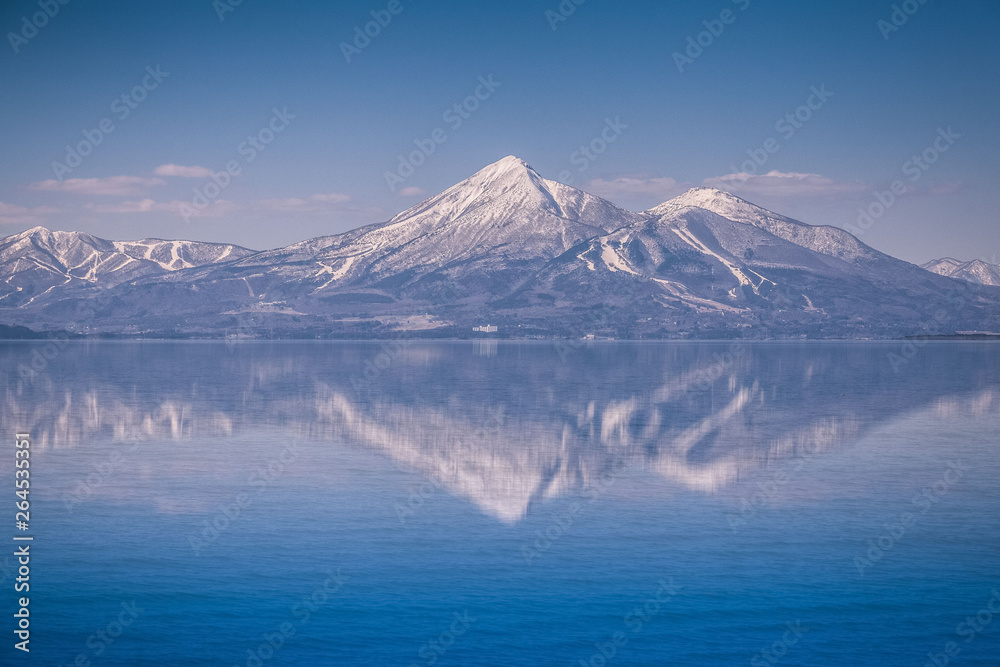 Mt.Bandai with reflection at Inawashiro Lake in spring