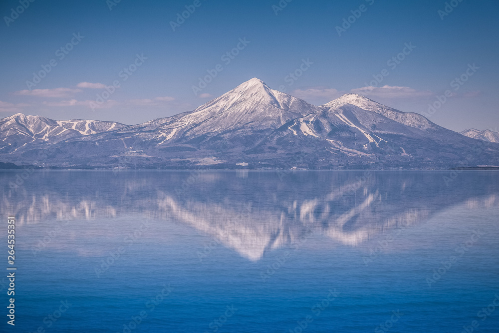Mt.Bandai with reflection at Inawashiro Lake in spring Mt.Bandai with reflection at Inawashiro Lake in spring