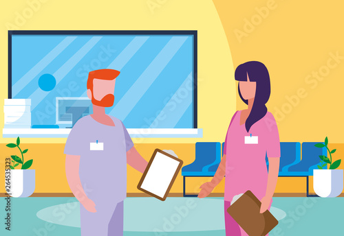 couple medicine workers in hospital reception