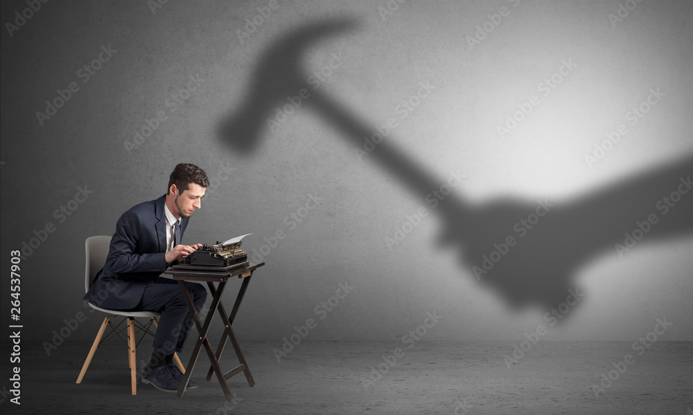 Shadow threatening hard worker man who is afraid
Shadow threatening hard worker man who is afraid