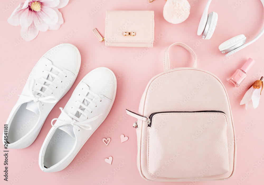 Flat lay with girls spring summer accessories in pink pastel tones. Casual urban summer style Flat lay with girls spring summer accessories in pink pastel tones. Casual urban summer style