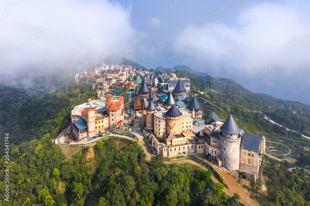 Aerial view of landscape is castles covered with fog at the top of Bana Hills, the famous destination of Da Nang, Vietnam
