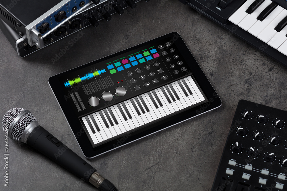 Piano synthesizer app on tablet and musical instrument concept
 - obrazy, fototapety, plakaty 