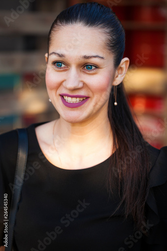 Close up, Portrait of a young beautiful brunette girl at sunset day © Andrey_Arkusha