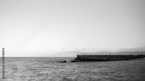 Pizzo calabro black and white long exposure pier and rocks