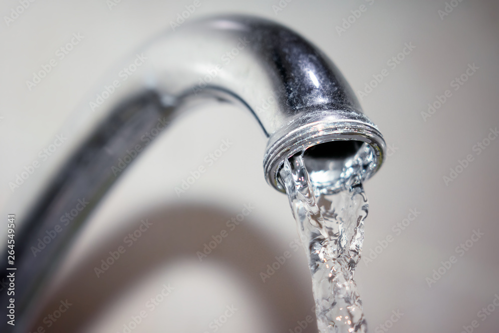 Clean Water Running out of the Tap Clean Water Running out of the Tap