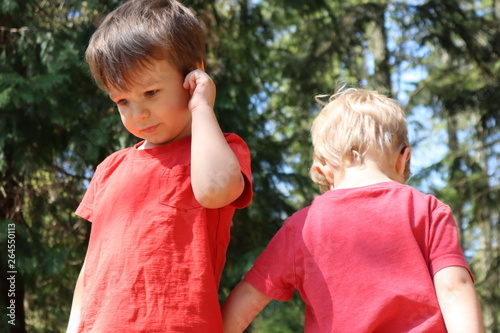 Boys with forest background