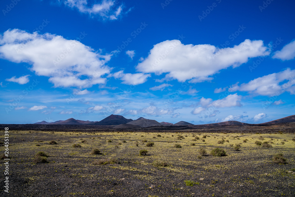 Spain, Lanzarote, Endless beautiful volcanic nature landscape of timanfaya volcanoes Spain, Lanzarote, Endless beautiful volcanic nature landscape of timanfaya volcanoes