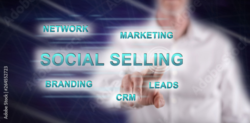 Man touching a social selling concept