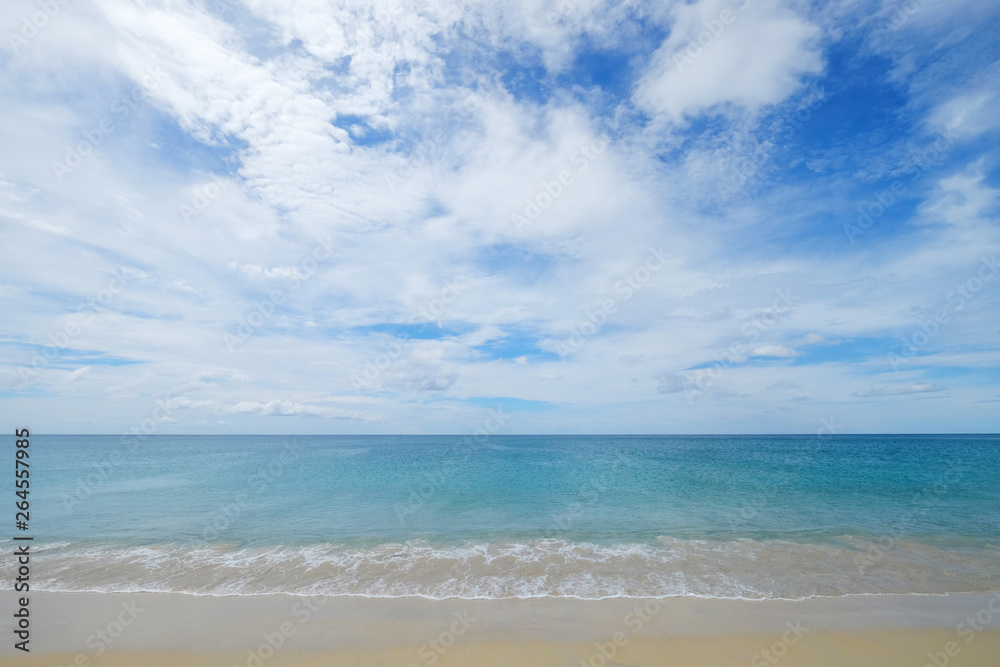 Calm and clear sea view of turquoise water with small ripple wave on cloudy blue sky day