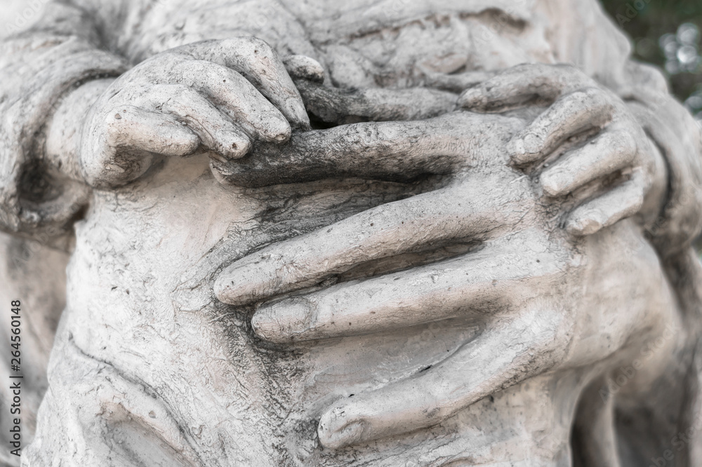 Marble statue with hands of child and woman Marble statue with hands of child and woman