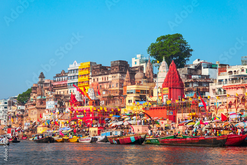 Colorful boats and Ganges river photo