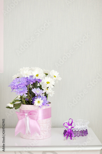 Fototapeta Naklejka Na Ścianę i Meble -  beautiful flowers in vase on white background