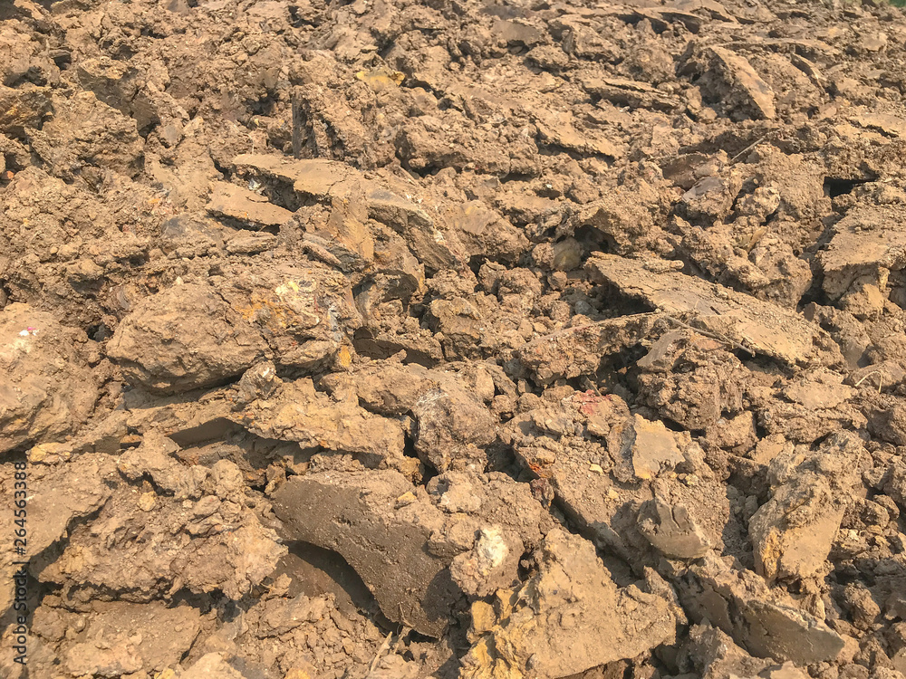 pile of cracked dry dirt in construction site pile of cracked dry dirt in construction site