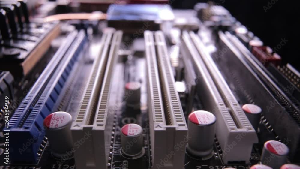 Macro view of PCI-E slots on the motherboard, slider shoot Macro view of PCI-E slots on the motherboard, slider shoot