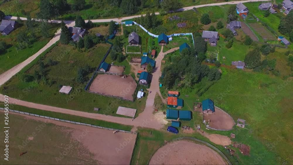 Top view of horse farm and pasture in the countryside Top view of horse farm and pasture in the countryside