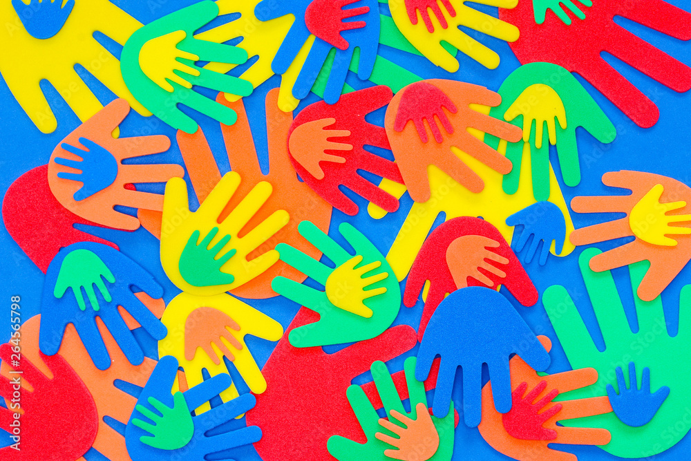 Plakat Abstract background of funky foam hands cutouts of different sizes in red, orange, yellow, green and blue