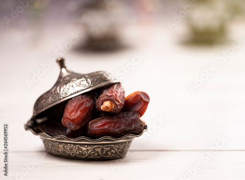 Dates fruit in traditional copper pot