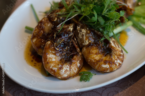 Seared King Prawns with Superior Soy Sauce and garnished with parsley on top