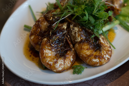 Seared King Prawns with Superior Soy Sauce and garnished with parsley on top