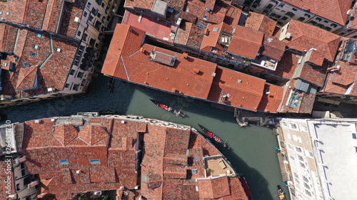 Aerial drone photo of iconic and unique Grand Canal crossing city of Venice as seen from high altitude, Italy