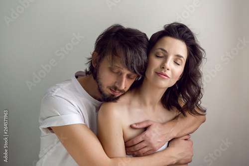 guy and a girl on a white background in the Studio