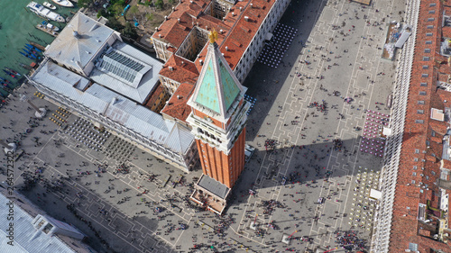 Aerial drone photo of iconic and unique Campanile in Saint Mark's square or Piazza San Marco, Venice, Italy photo