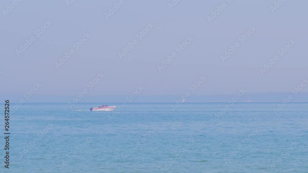 Boat in motion. Water transportation and summer leisure time activity. Boat in motion. Water transportation and summer leisure time activity.