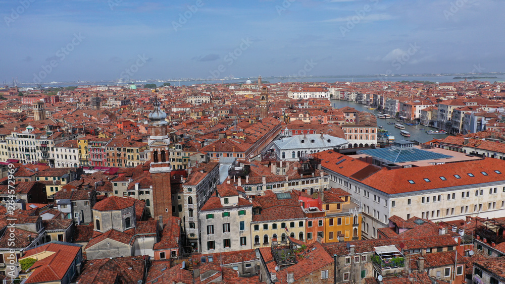 Obraz premium Aerial drone photo of iconic and unique Grand Canal crossing city of Venice as seen from high altitude, Italy