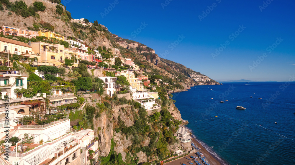 aerial view of the touristic city, the mountains and the beach, hotels and restaurants, buildings, business tours, sea holidays, luxury apartments Positano, Amalfi, Italy