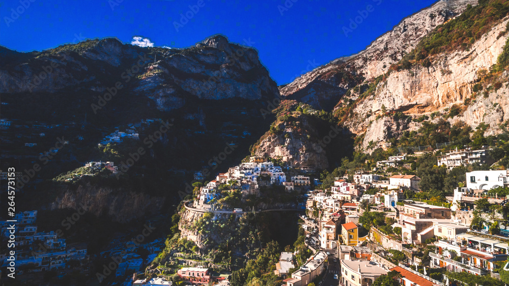 aerial view of the touristic city, the mountains and the beach, hotels and restaurants, buildings, business tours, sea holidays, luxury apartments Positano, Amalfi, Italy
